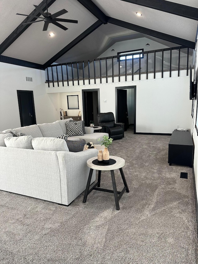 living room featuring high vaulted ceiling, ceiling fan, carpet floors, and beam ceiling