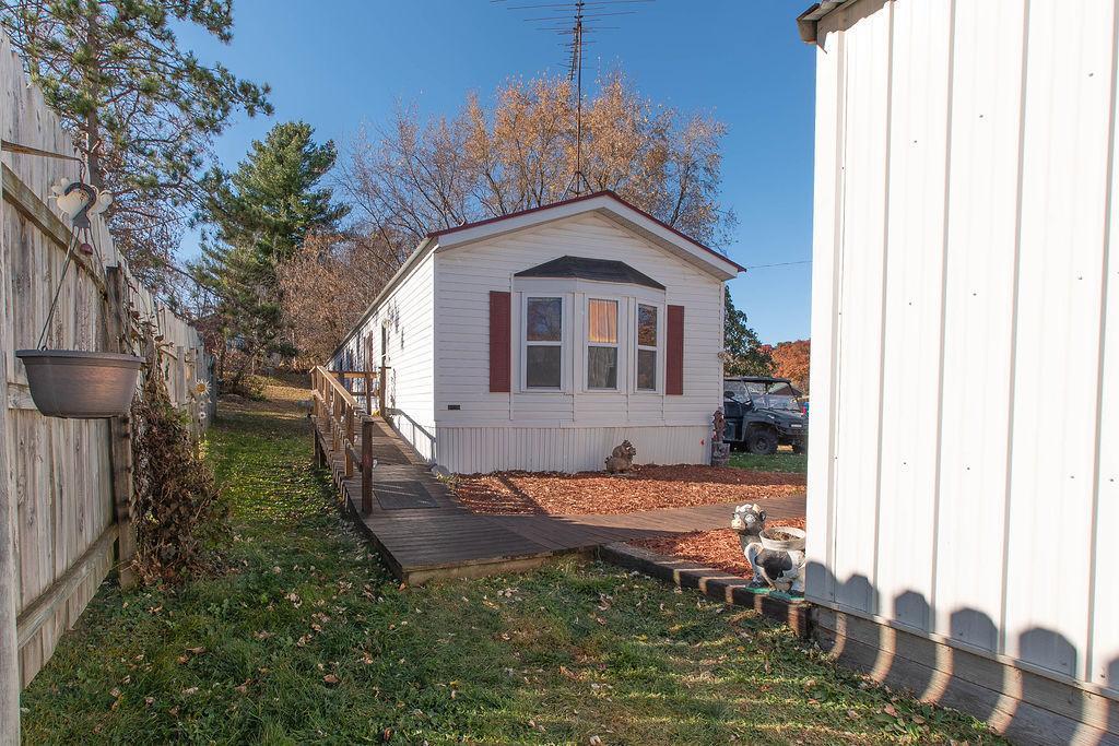 view of home's exterior featuring a yard