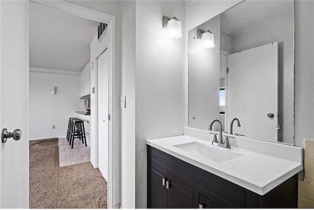 bathroom featuring tile patterned floors and vanity