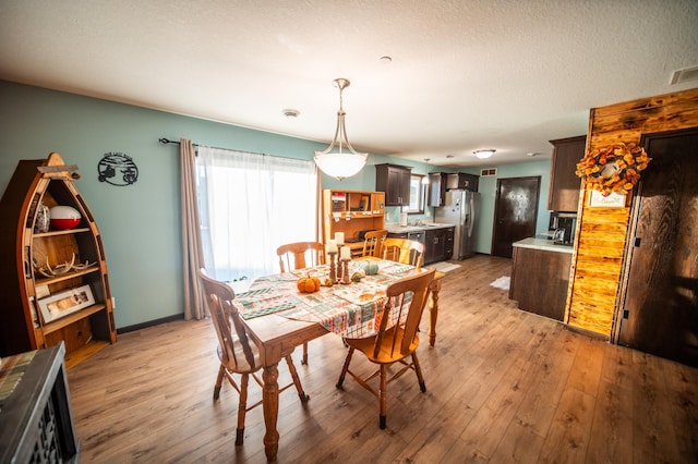 dining area featuring light hardwood / wood-style flooring