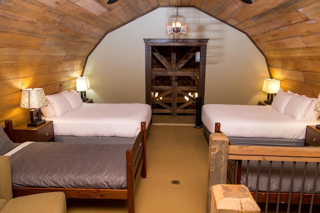 bedroom with wood ceiling, vaulted ceiling, and an inviting chandelier