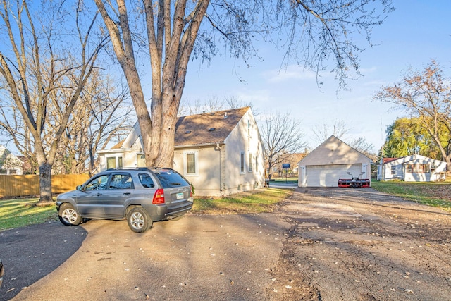 view of front of property with an outbuilding and a garage