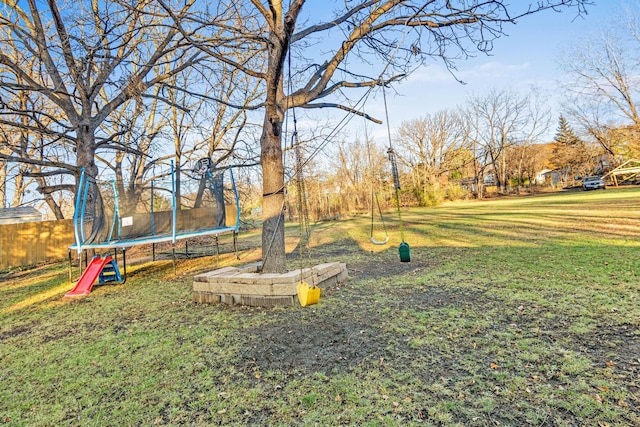 view of yard with a trampoline