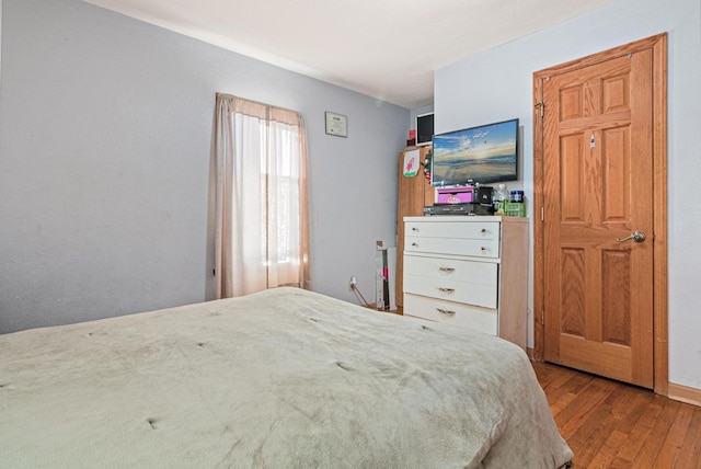 bedroom featuring light hardwood / wood-style flooring