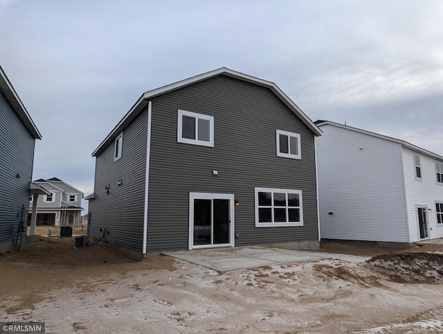 back of property with a patio area