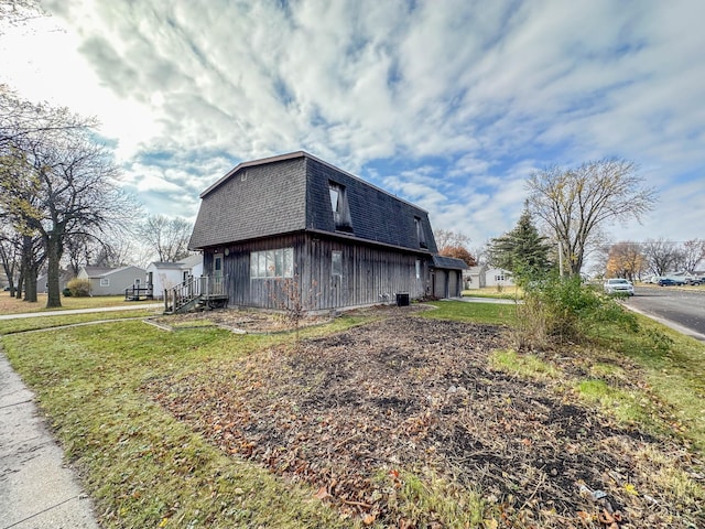 view of property exterior featuring a garage