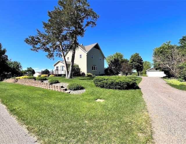 view of property exterior with a lawn