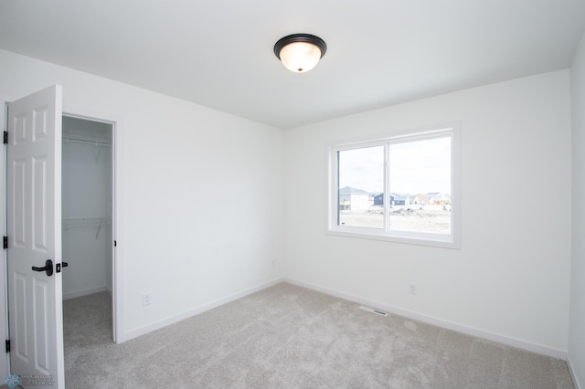 6652 32nd St S, Fargo, ND 58104 - unfurnished room with light carpet and baseboards