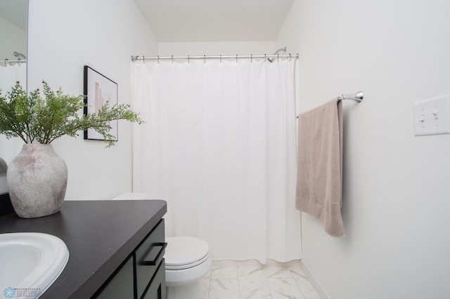 6652 32nd St S, Fargo, ND 58104 - full bathroom with marble finish flooring, vanity, toilet, and a shower with shower curtain