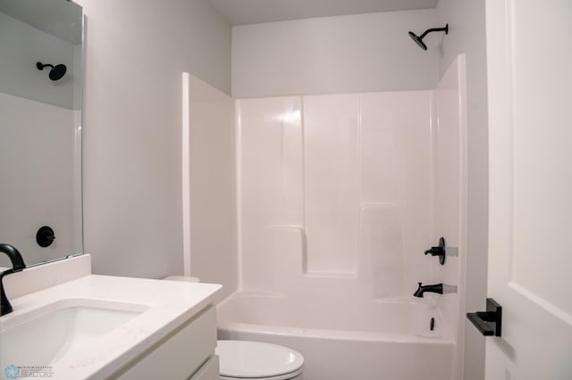 full bathroom featuring toilet, shower / bathing tub combination, and vanity