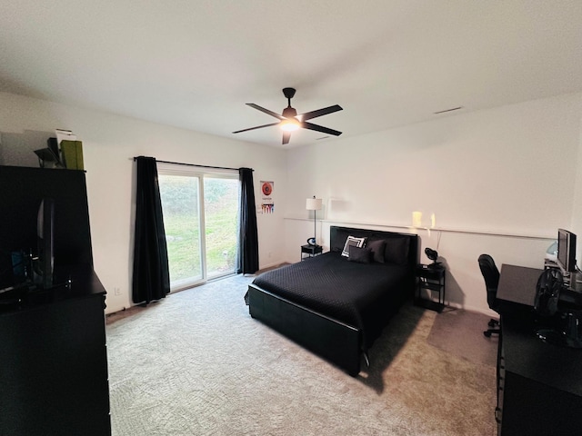 carpeted bedroom with access to exterior and ceiling fan