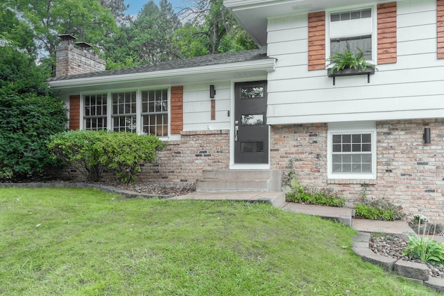 exterior space featuring a front lawn