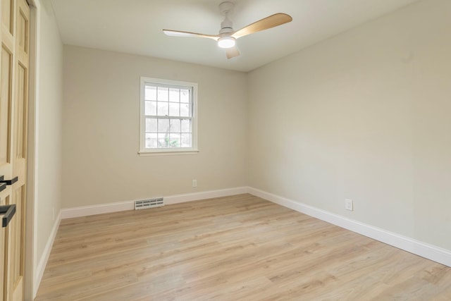 unfurnished room featuring light wood-type flooring and ceiling fan