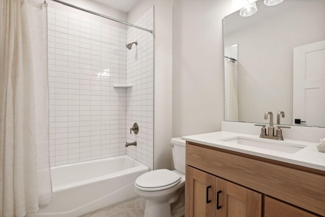 full bathroom with vanity, toilet, and shower / tub combo