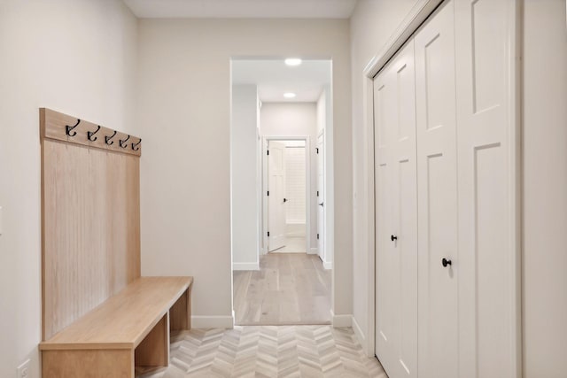 mudroom with light parquet floors