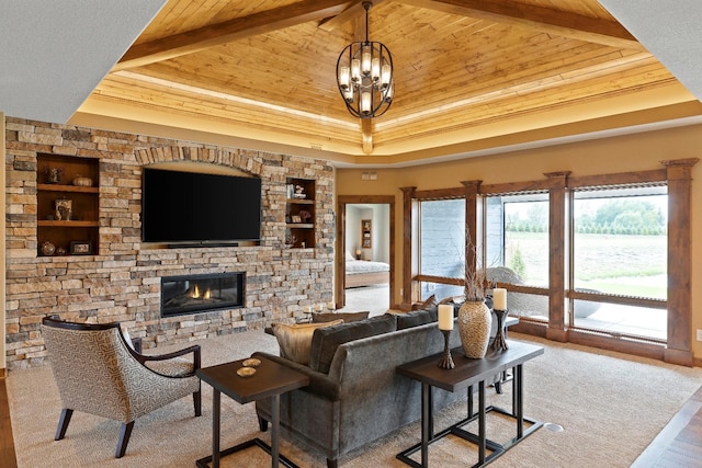 living room featuring a stone fireplace, light wood-type flooring, beamed ceiling, and wood ceiling