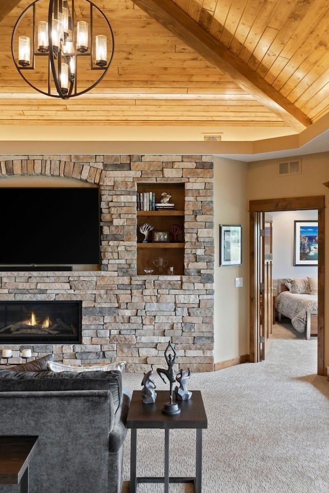 carpeted living room with a fireplace, beam ceiling, and wood ceiling