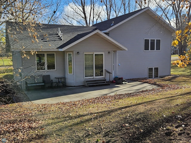 back of house with a patio area