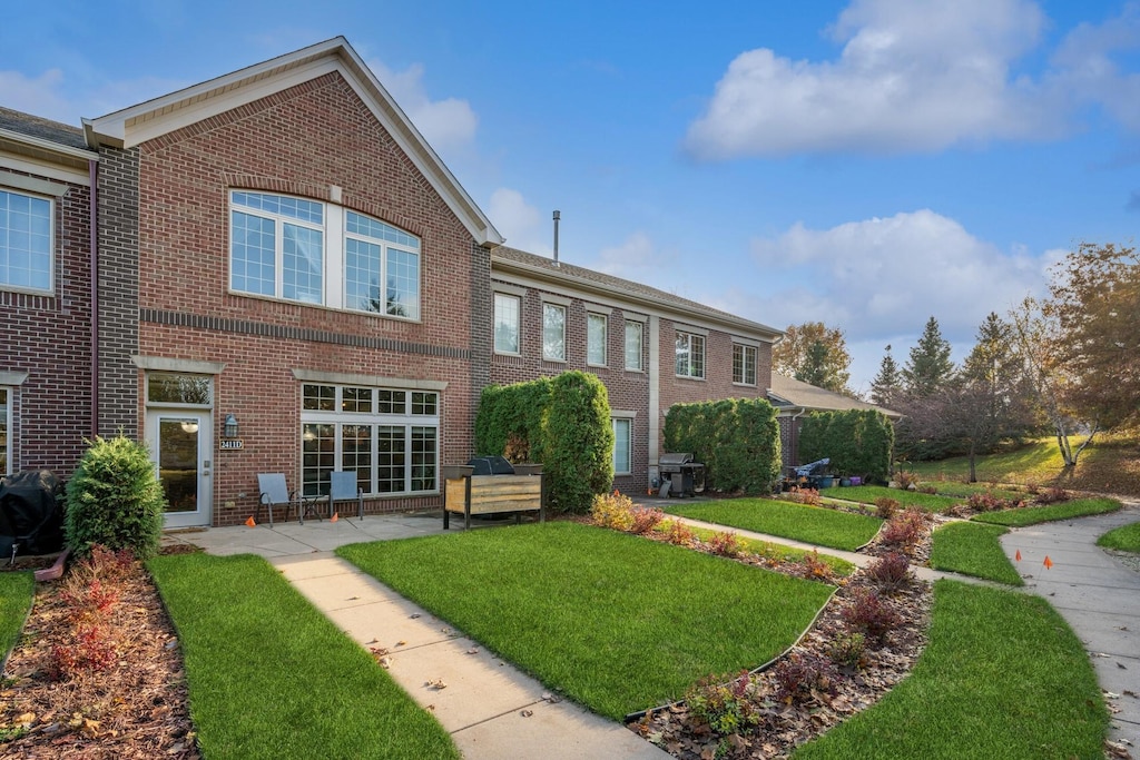 exterior space with a front lawn