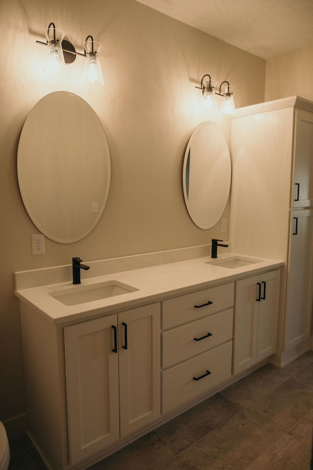 bathroom featuring vanity and wood-type flooring