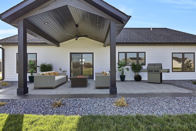 rear view of property with outdoor lounge area and a patio area