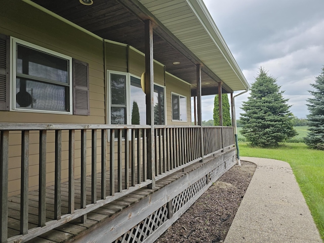 view of property exterior with covered porch