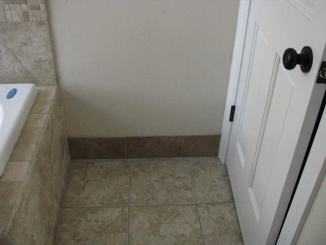 bathroom featuring tile patterned flooring