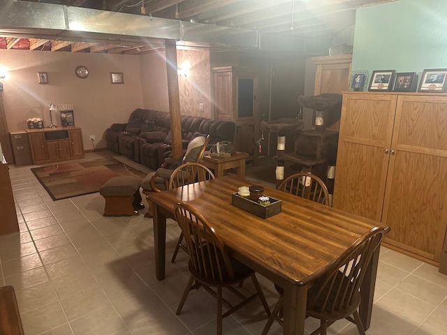 dining area featuring light tile patterned flooring