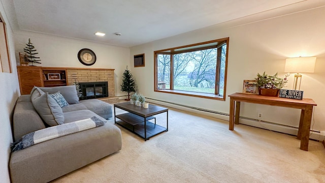 living room with baseboard heating, light colored carpet, and a fireplace