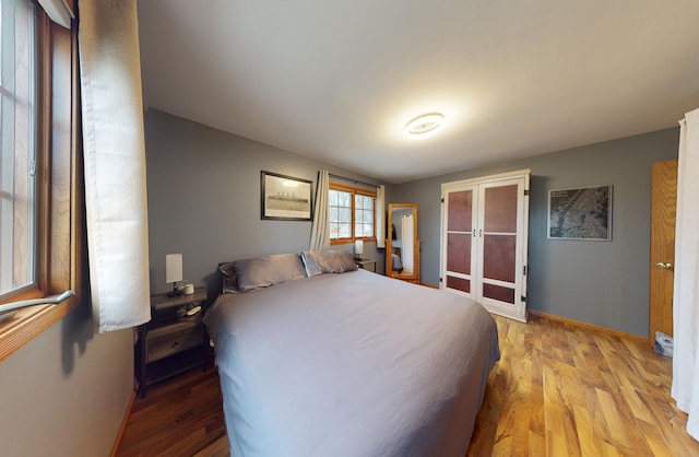 bedroom with light hardwood / wood-style floors