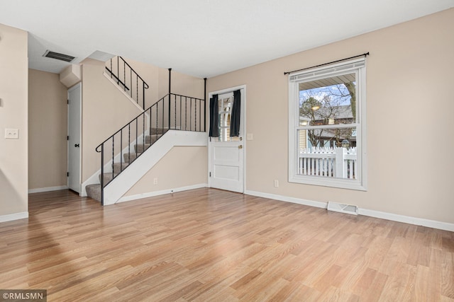 interior space with light hardwood / wood-style floors