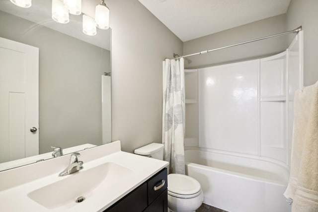 full bathroom featuring vanity, shower / bathtub combination with curtain, and toilet