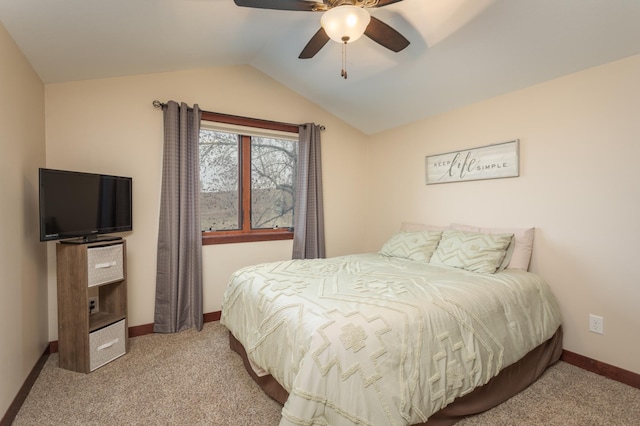 carpeted bedroom featuring ceiling fan and lofted ceiling