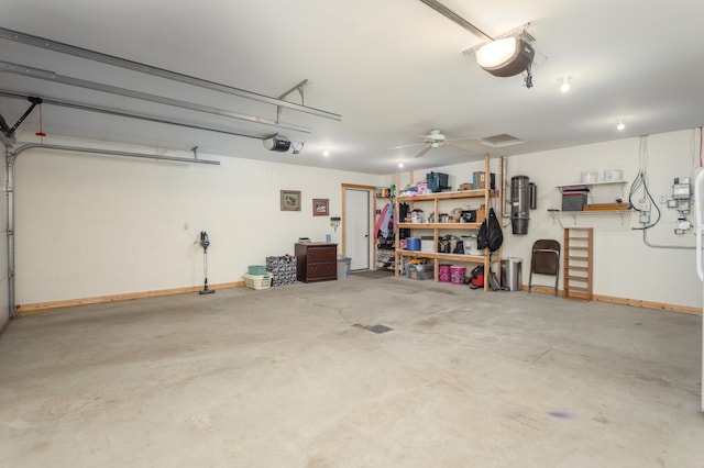 garage with ceiling fan and a garage door opener