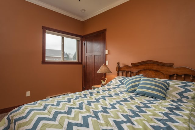 bedroom with ornamental molding