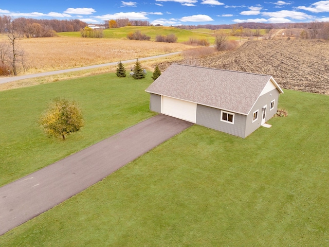 birds eye view of property featuring a rural view