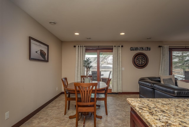 dining space featuring plenty of natural light