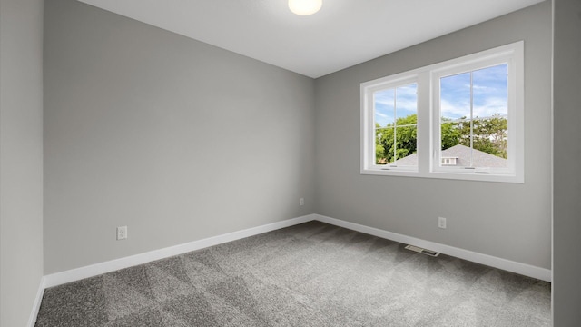 empty room featuring carpet