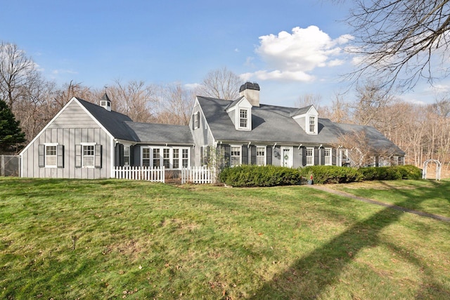 back of house featuring a yard