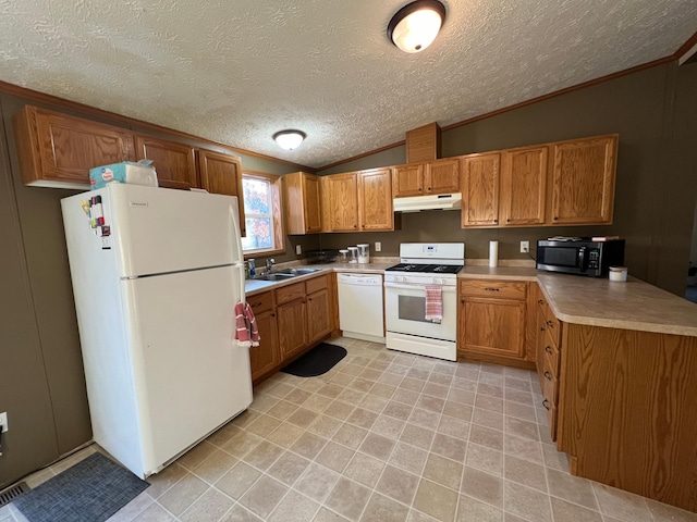 kitchen featuring ornamental molding, a textured ceiling, sink, white appliances, and lofted ceiling