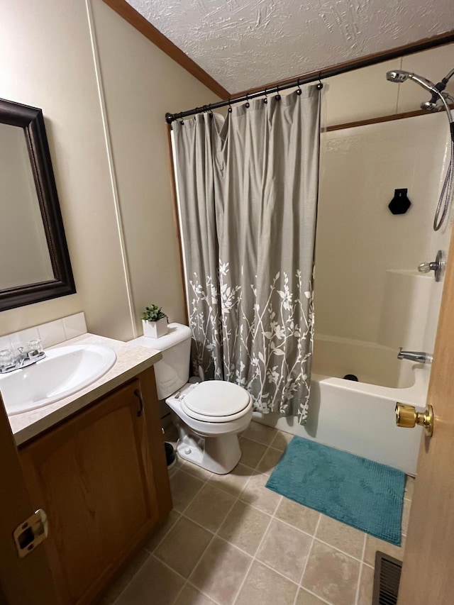 full bathroom featuring tile patterned floors, crown molding, toilet, a textured ceiling, and shower / tub combo with curtain