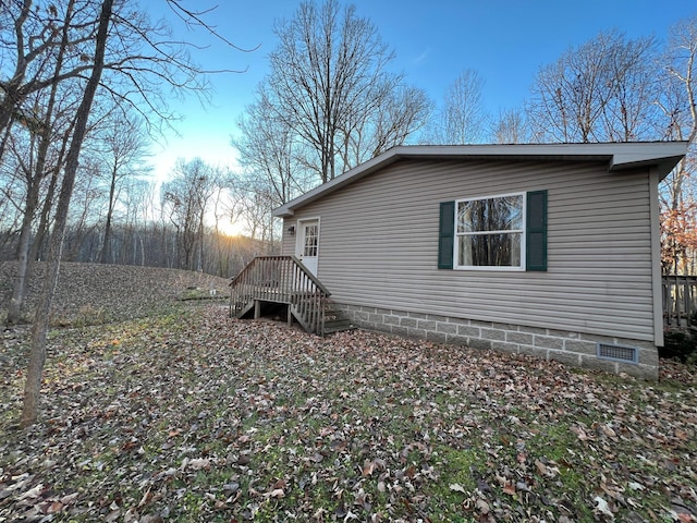 view of property exterior at dusk