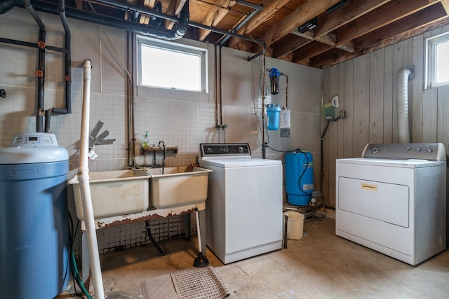 washroom featuring separate washer and dryer and plenty of natural light