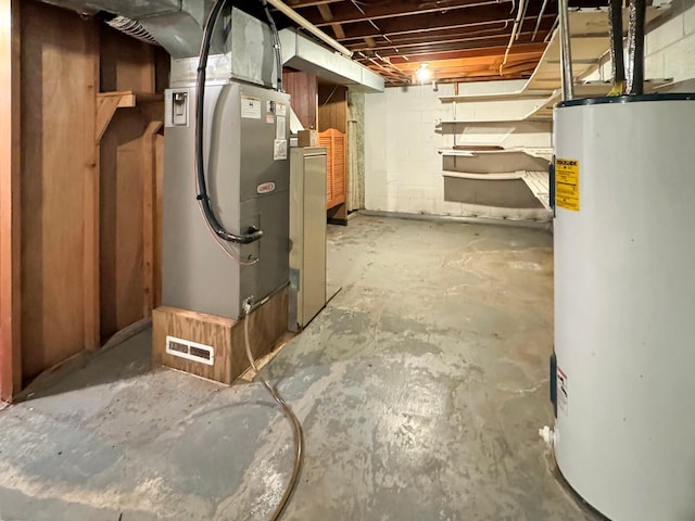 basement with electric water heater and heating unit