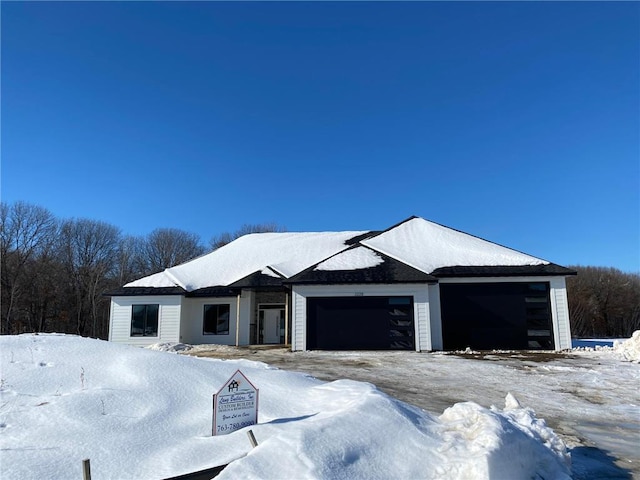 view of front of home with a garage