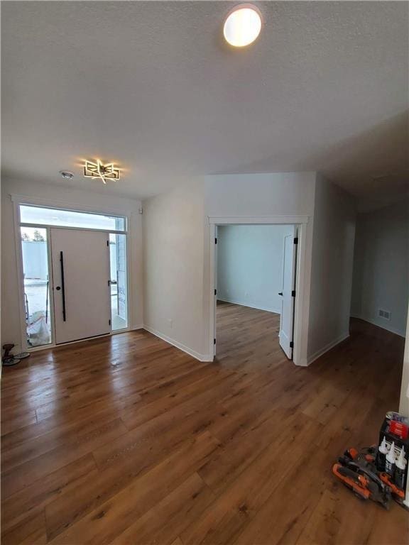 foyer featuring dark hardwood / wood-style floors