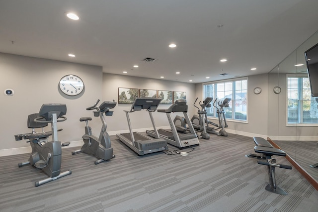 gym featuring light colored carpet