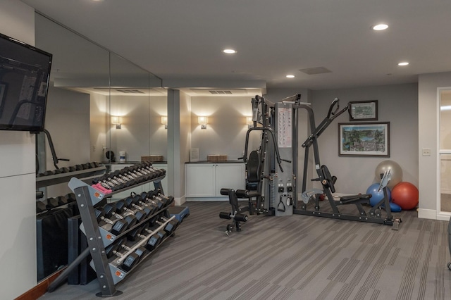 workout area with carpet floors