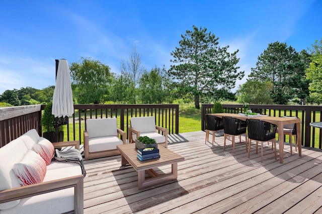 wooden terrace featuring an outdoor hangout area