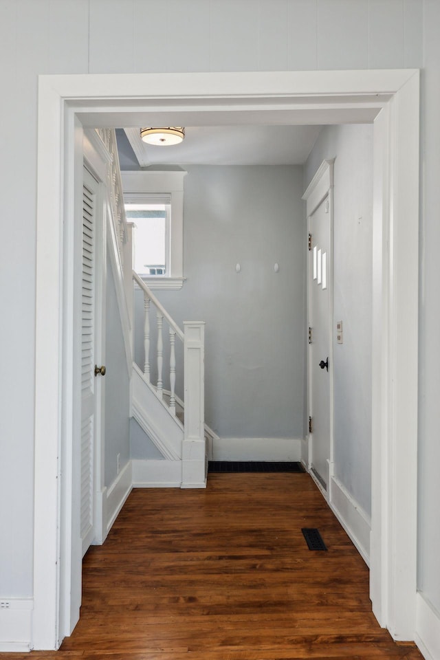 interior space with dark wood-type flooring